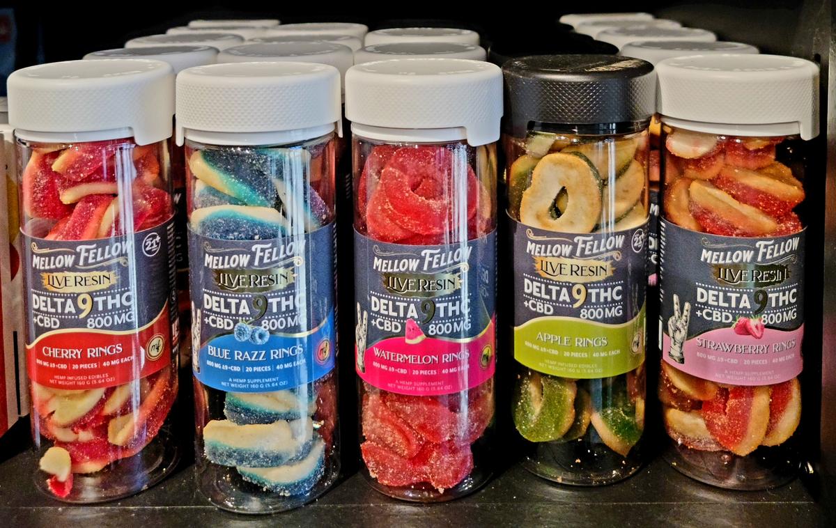 Assorted hemp-derived products including gummies and tinctures on display