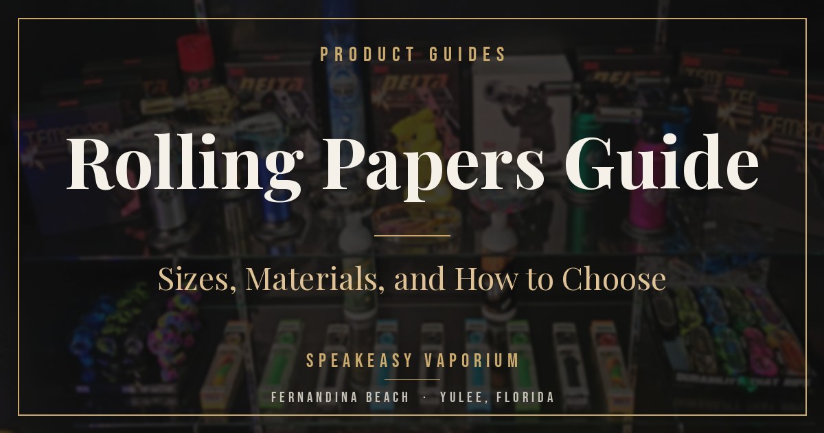 Rolling papers, rolling trays, and torch lighters on the accessory shelves at Speakeasy Vaporium in Yulee, Florida